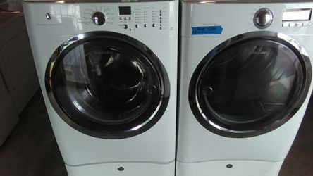 Electrolux front load washer and dryer with pedestal one year warranty delivery available