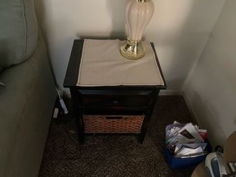 Wooden end table with wicker drawer
