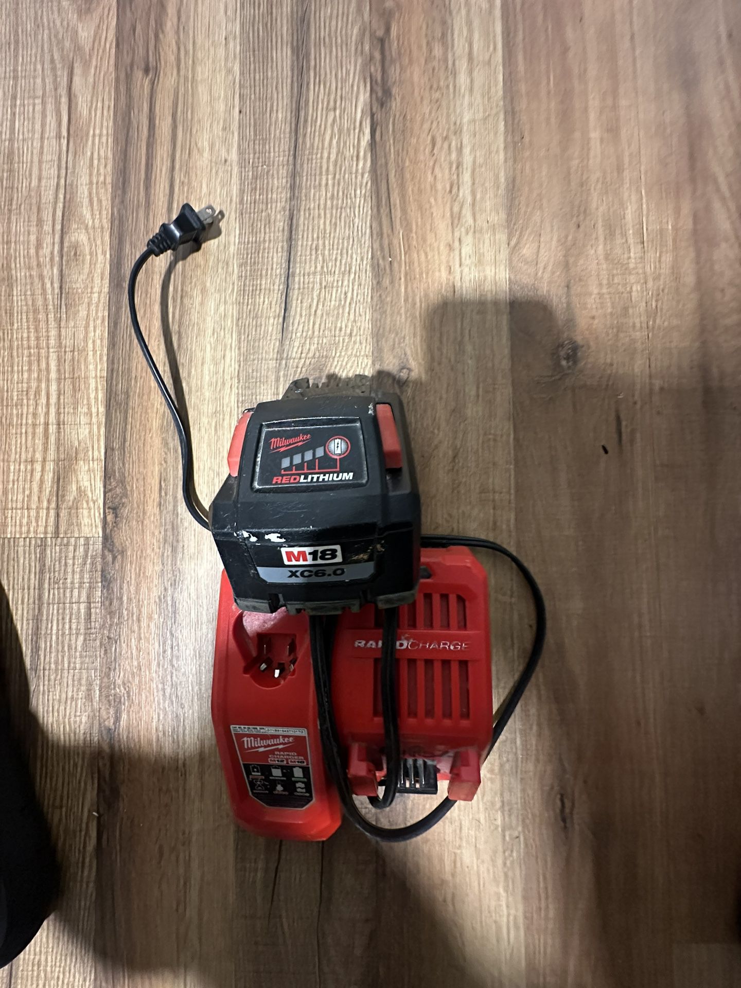Milwaukee M18 Battery And A Super Fast Charger 