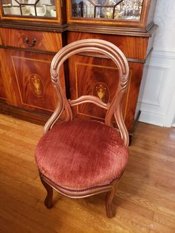 Antique balloon back parlor chair with burgundy velour fabric