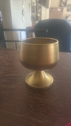 Golden flower holder