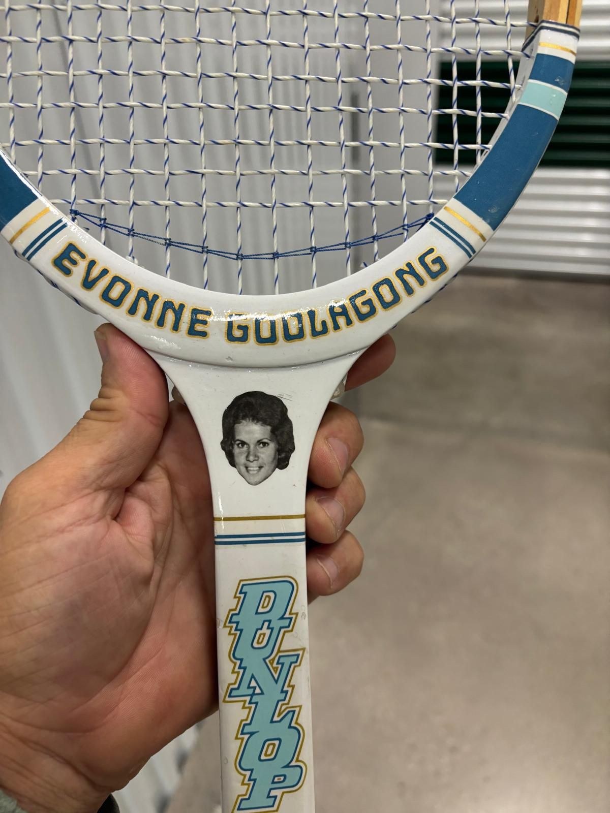 vintage Dunlop Evonne Goolagong wooden tennis racquet.  This model features a photo decal of Evonne Goolagong