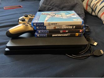 PS4 W Controller and Four Games