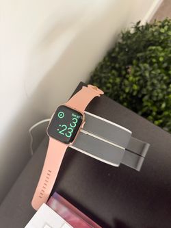 Apple Watch Series 5 with Pink Sport Band and Charging Cable