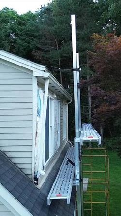 Pump jacks with 2 poles, 2 scaffolding, and 2 jacks
