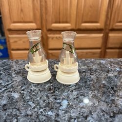 Vintage 1960's lot of 2 Miniature Hard Plastic Celluloid Oil Lamp, Lanterns.  Size approximately 3 inches tall.  Preowned the labels are worn.  Has be