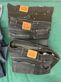 Lot jeans 19 pairs men’s Levi, wrangler etc