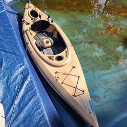10' Kayak W/ paddle, dolly