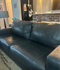 Like new! Leather Sofa and Loveseat- Ashley Furniture