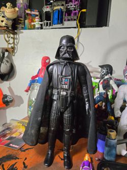 vintage 1978 Kenner Star Wars 15-inch Darth Vader action figure.