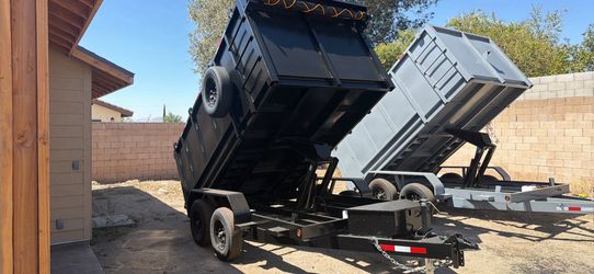 Scissor hoist dump trailer