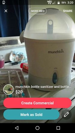 Munchkin baby bottle sanitizer and bottle rack