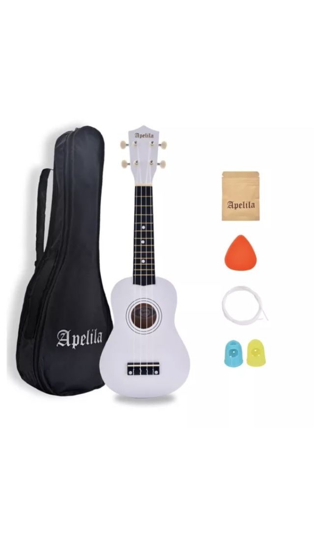 Brand new white ukulele