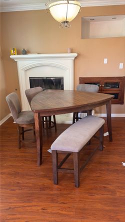 Kitchen table with bench and three chairs