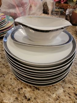 Beautiful silver edge plates and sauce cup