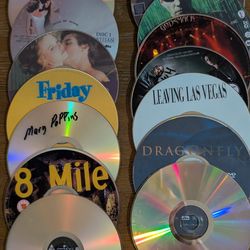 45+ DVD's as is in a rare 7" x 7" storage box