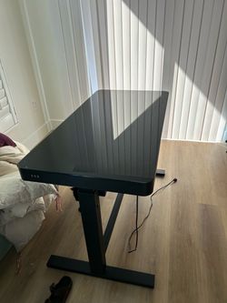 Smooth finish electric black standing desk