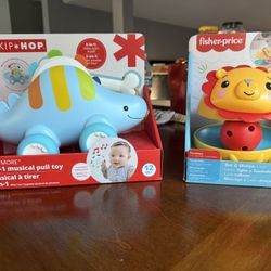 Skip Hop Dinosaur Pull Along Baby Musical Toy & Fisher Price Bat & Wobble Lion