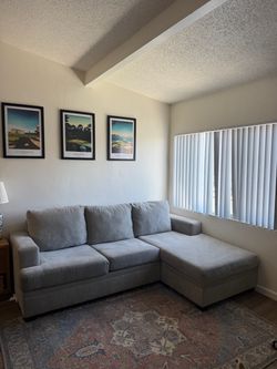 Gray Living Spaces Sectional Sofa with Chaise
