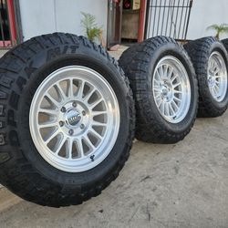 18" KMC rims KM733 w- 32" Falken Wildpeak MT tires 