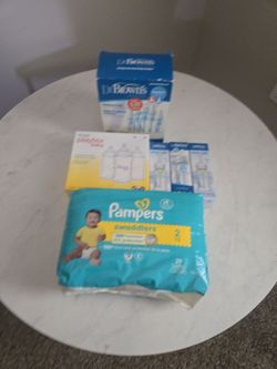 Baby bottles and diapers size 2