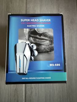 New Hexus 5-in-1 electric razor grooming kit for men. This black shaver has an IPX7 waterproof rating for wet or dry use. It includes a rotary head sh