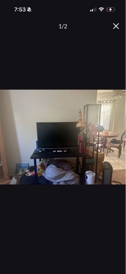 Tv with with black tv table