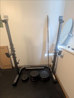 Squat rack + Barbell + Plates