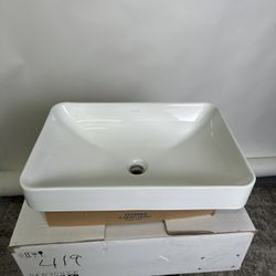 Kohler rectangular vessel sink.