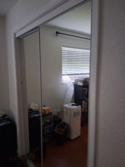 Mirrored closet doors and frames
