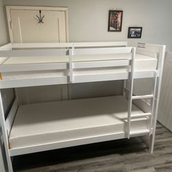 Twin over twin bunk bed. Available in espresso, white, & grey. Assembly required.  Assembly not included.  Tax included.  Free local delivery. 

Bunk 