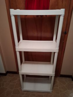 White plastic shelving unit