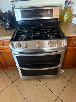 Washer dryer and a gas stove