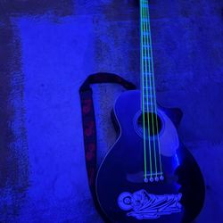 bajo kingman it has neon strings and a san judas Trades Or Pay