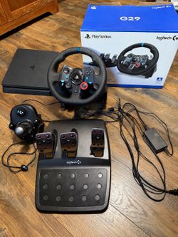 Logitech G29 Steering Wheel with pedals and gear shifter also a PlayStation 4