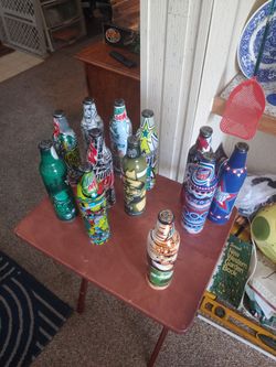 Unopened 2008 green label edition mountain dew bottles