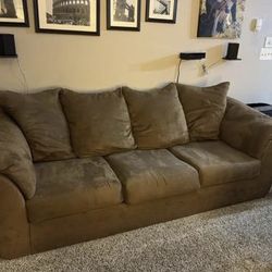 Up for sale is an Ashley Furniture Couch and Loveseat!