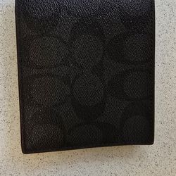 New Authentic Coach Wallet:  $70