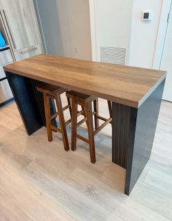 Island table with bar stools
