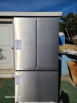 Kenmore 20.3 cu.ft counter depth 3 door bottom freezer refrigerator in stainless steel with e-star