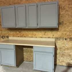 Gray Base & Upper Cabinetry w/ Laminate Countertop