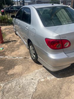 Toyota Corolla, grey in color