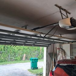 Garage Door Broken Spring Opener Off Track Replace Adjustment and parts