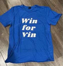 Blue "Win for Vin" graphic tee with white text