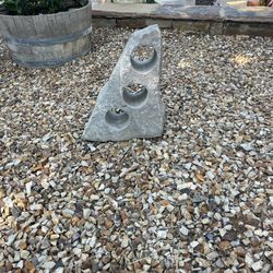 Stone With 3 Holes Bored Thru It