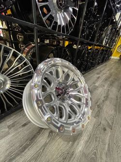 17x9 5-127 Fuel Surge Silver Machine