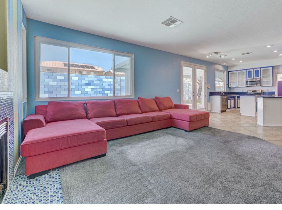 Large Red Sofa With Two Recliners