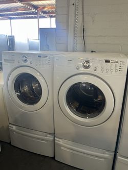 LG Washer & Electric Dryer with Pedestals