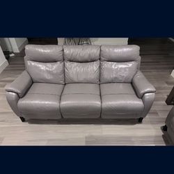 2-Piece Gray Leather Sofa Set – V Good Condition