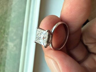 Moissanite and white gold ring